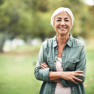 senior-woman-outdoors-smiling-sq-400 Senior woman outdoors smiling